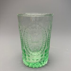 Svícen green glass fleur de lis